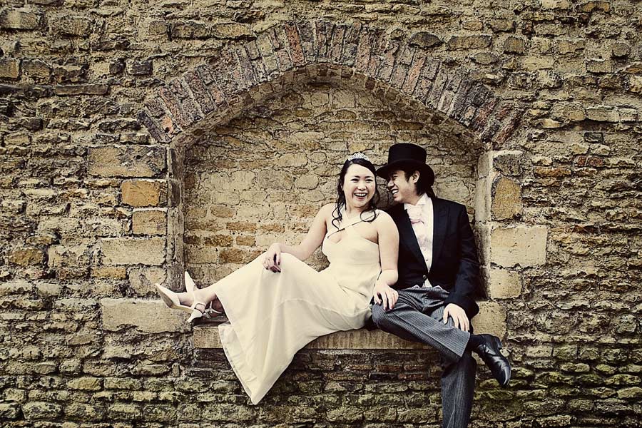 Bride and Groom sitting in wall of Senate Passage