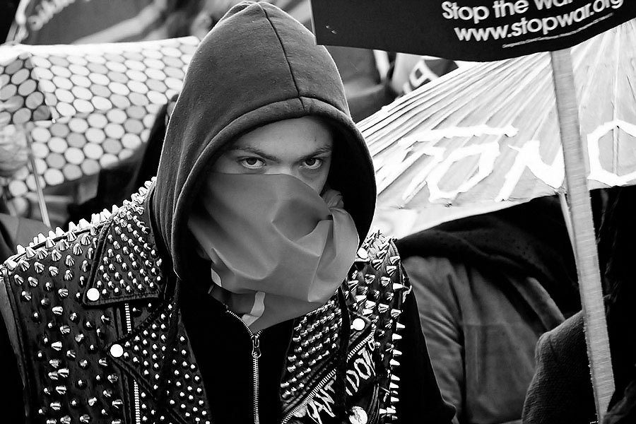 Masked protester at the G20 march in London G20 summit protest in London