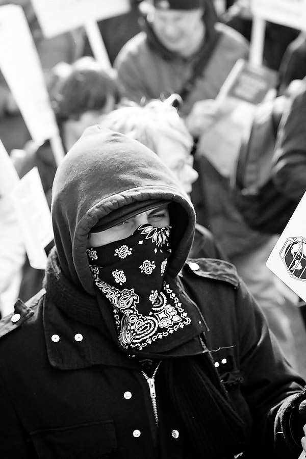 Masked Protesters at the G20 march G20 summit protest in London