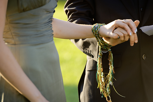 wedding handfastening ceremony at Stonehenge