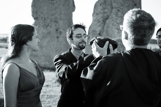 wedding handfastening ceremony at Stonehenge